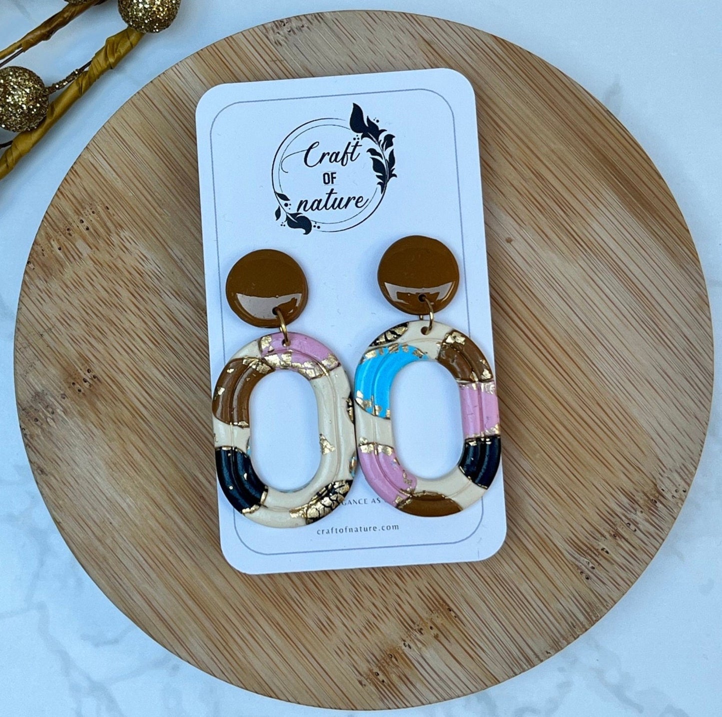 Single Drop Oval Hoop Earrings Blossom Design